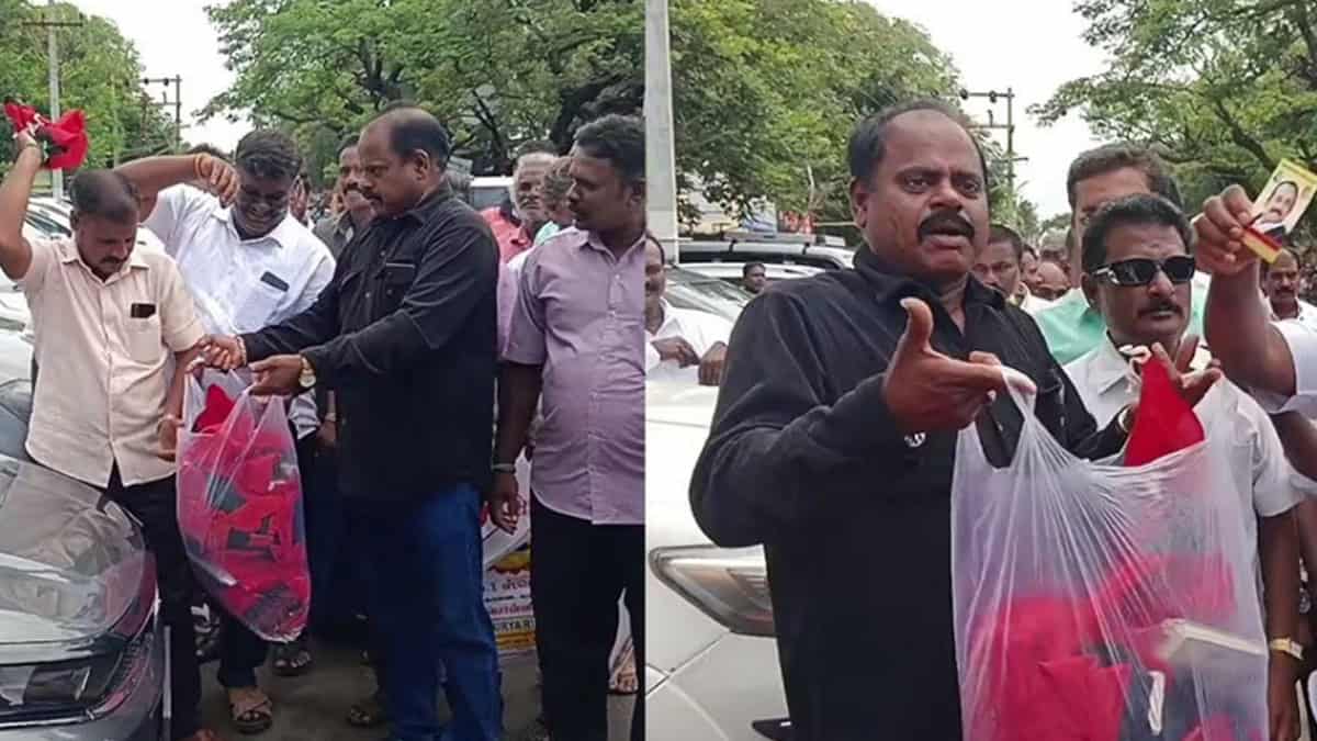 Activists threw the MDMK flag around their heads.. in support of Mallai Sathya